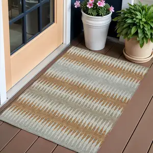Photo of Orange Gray And Beige Striped Washable Indoor Outdoor Area Rug