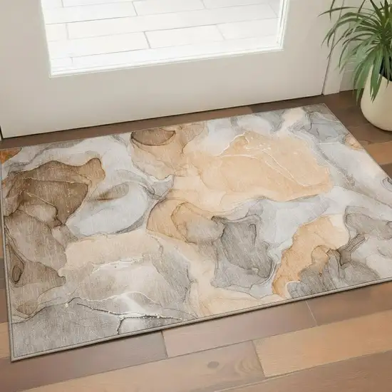 Orange Gray And Ivory Abstract Washable Area Rug With UV Protection Photo 1