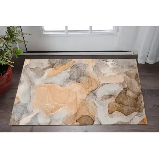 Orange Gray And Ivory Abstract Washable Area Rug With UV Protection Photo 2