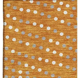 Photo of Orange Gray And Ivory Polka Dot Washable Area Rug With UV Protection