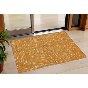Photo of Orange Gray And Ivory Polka Dot Washable Indoor Outdoor Area Rug