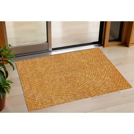 Orange Gray And Ivory Polka Dot Washable Indoor Outdoor Area Rug Photo 1