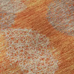 Photo of Orange Gray And Silver Abstract Washable Area Rug With UV Protection