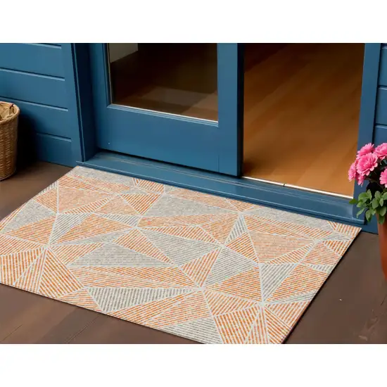 Orange Gray And Silver Geometric Washable Indoor Outdoor Area Rug Photo 1