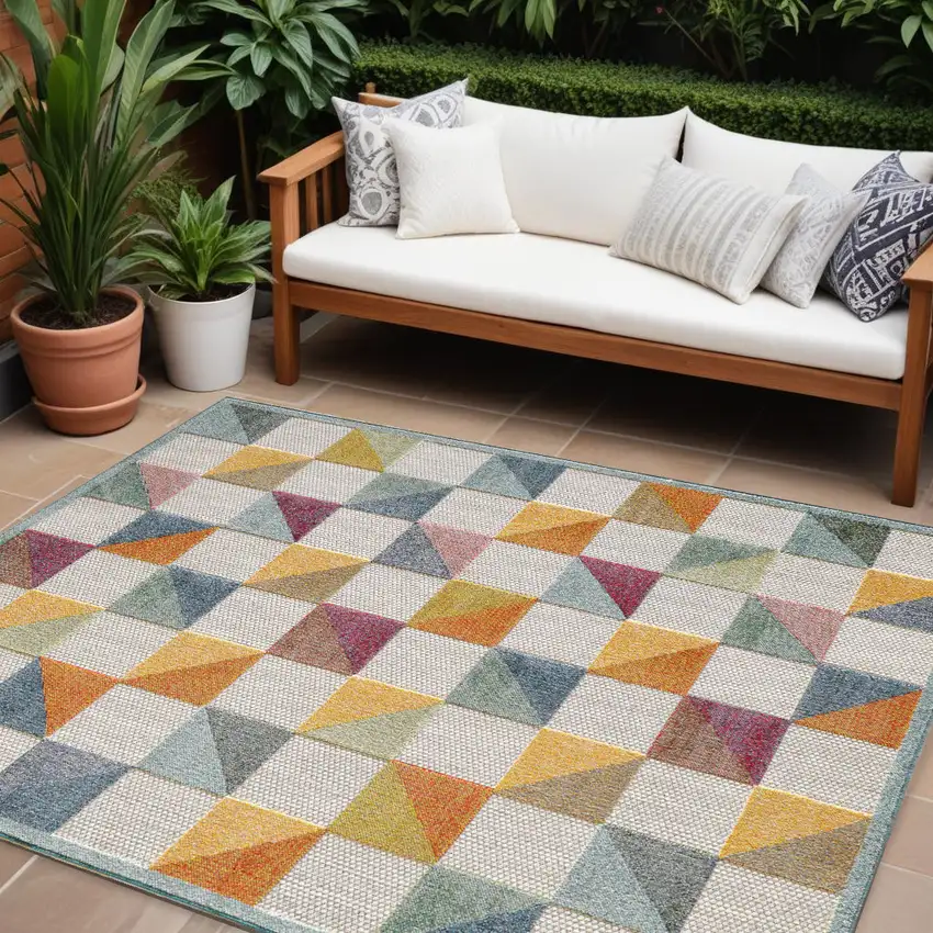 Orange And Ivory Geometric Stain Resistant Indoor Outdoor Area Rug Photo 1