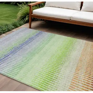 Photo of Orange Green And Blue Striped Washable Indoor Outdoor Area Rug