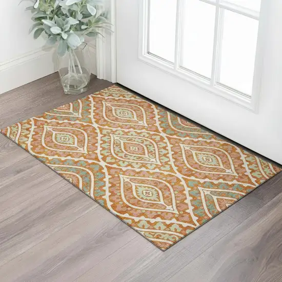 Orange Green And Ivory Diamond Washable Area Rug With UV Protection Photo 1