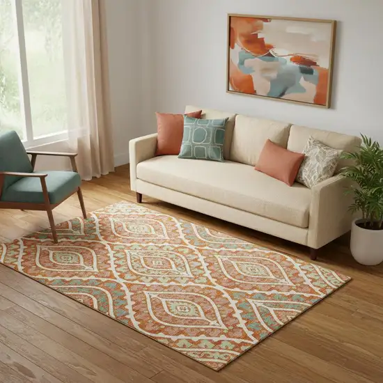 Orange Green And Ivory Diamond Washable Area Rug With UV Protection Photo 1
