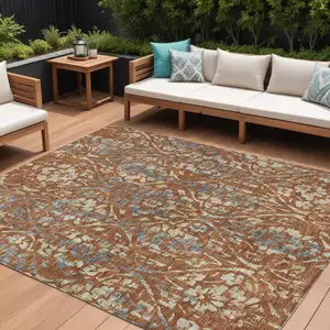 Photo of Orange Ivory And Dark Gray Floral Washable Indoor Outdoor Area Rug