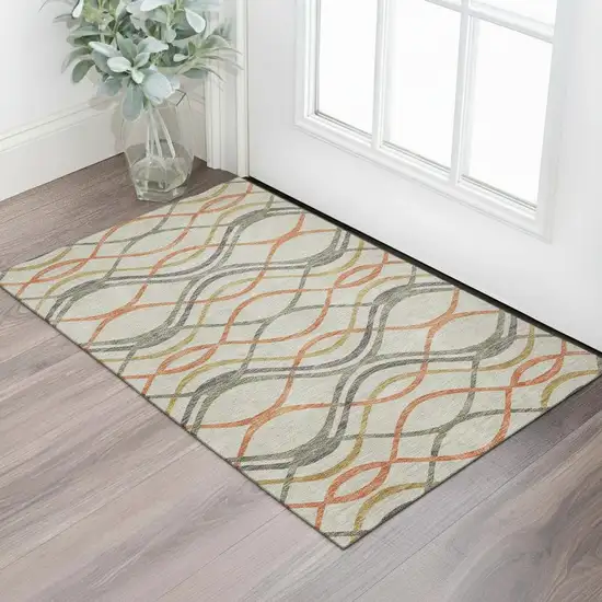 Orange Ivory And Gold Abstract Washable Area Rug With UV Protection Photo 1