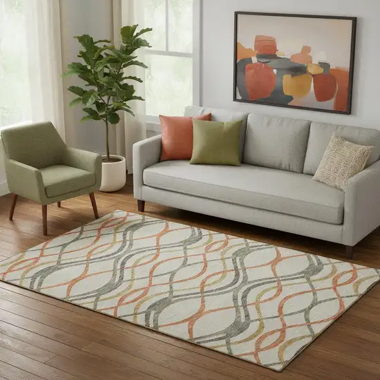 Orange Ivory And Gold Abstract Washable Area Rug With UV Protection Photo 1