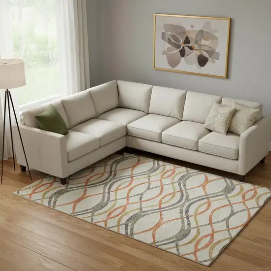 Orange Ivory And Gold Abstract Washable Area Rug With UV Protection Photo 1