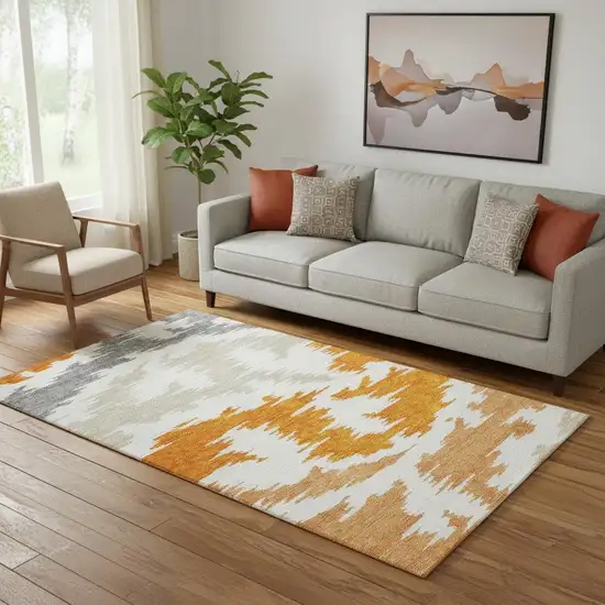 Orange Ivory And Gray Abstract Washable Area Rug With UV Protection Photo 1