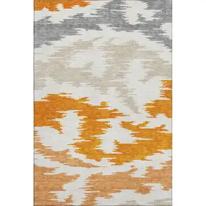 Photo of Orange Ivory And Gray Abstract Washable Area Rug With UV Protection