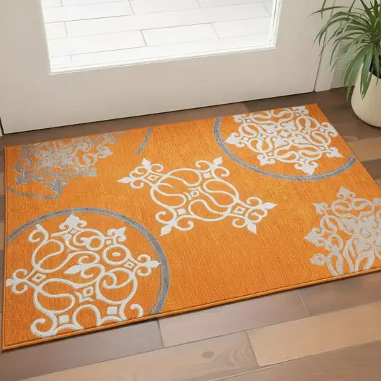 Orange Ivory And Gray Floral Medallion Washable Area Rug With UV Protection Photo 2