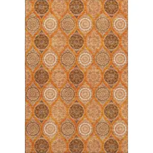 Photo of Orange Ivory And Gray Ogee Washable Area Rug With UV Protection