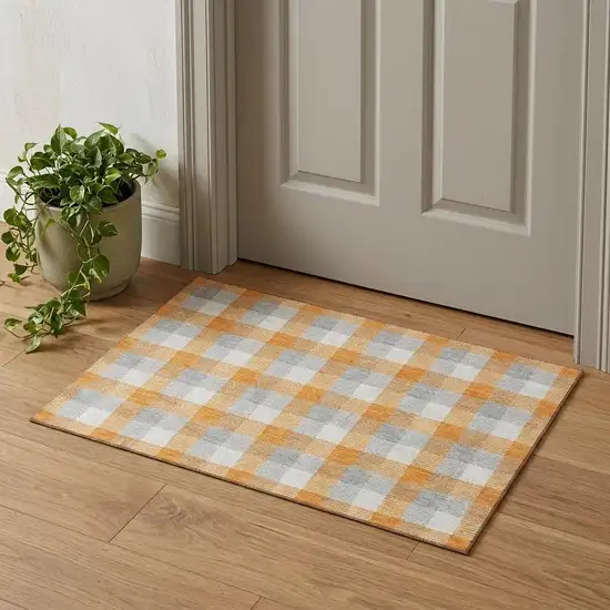 Orange Ivory And Gray Plaid Washable Area Rug With UV Protection Photo 1