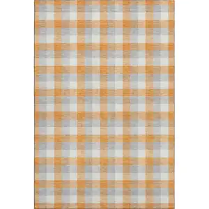Photo of Orange Ivory And Gray Plaid Washable Area Rug With UV Protection
