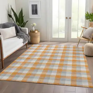 Photo of Orange Ivory And Gray Plaid Washable Area Rug With UV Protection