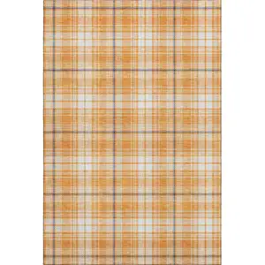 Photo of Orange Ivory And Navy Blue Plaid Washable Area Rug With UV Protection