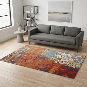 Photo of Orange Ivory And Teal Abstract Hand Tufted Area Rug