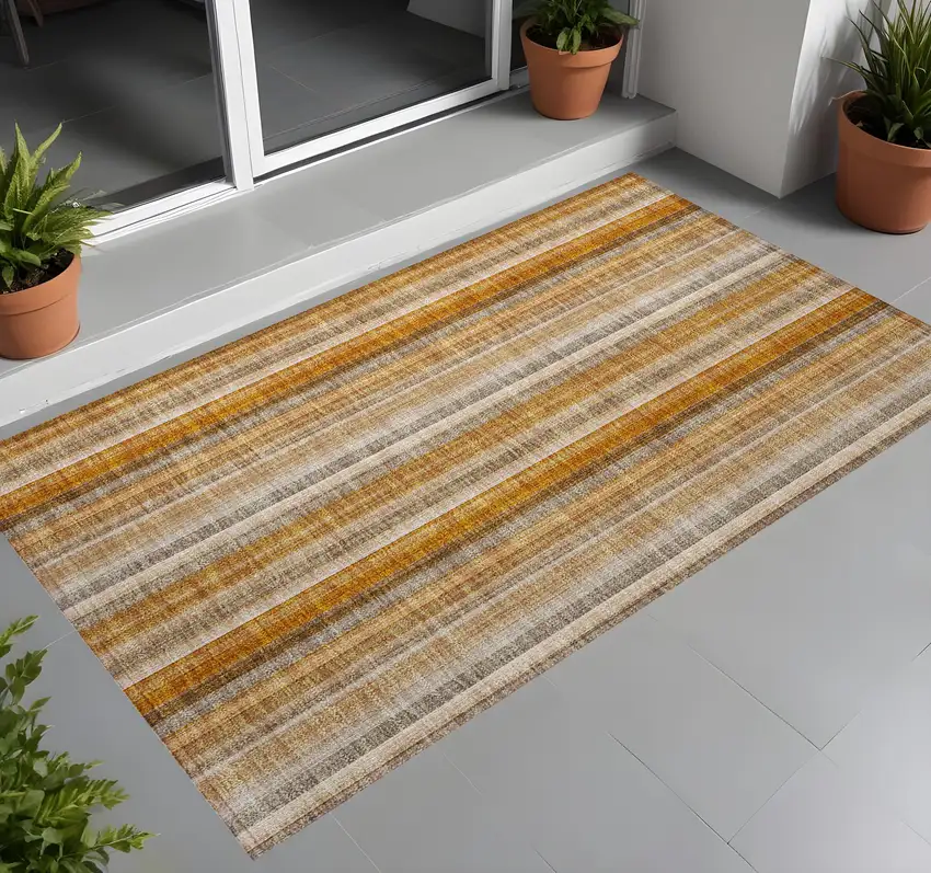 Orange Ivory and Gray Striped Washable Non Skid Indoor Outdoor Area Rug Photo 1