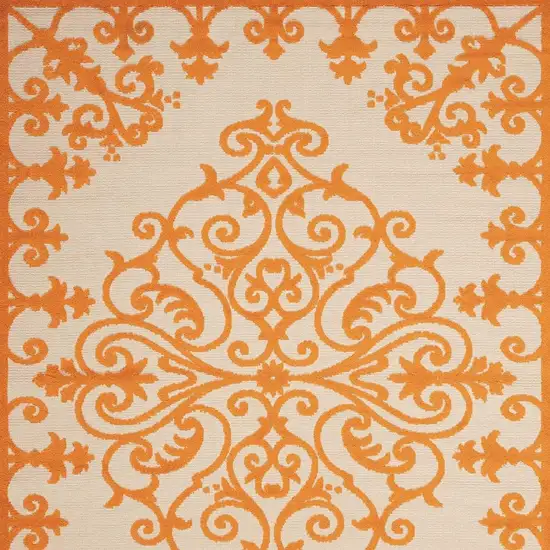 Orange And Ivory Damask Indoor Outdoor Area Rug Photo 7
