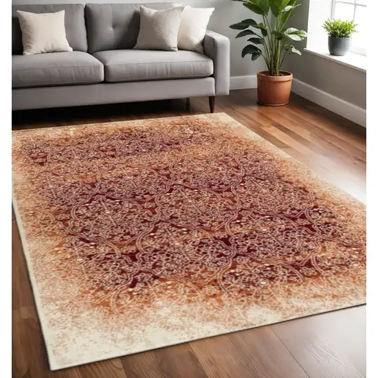 Orange Red And Ivory Medallion Area Rug Photo 1