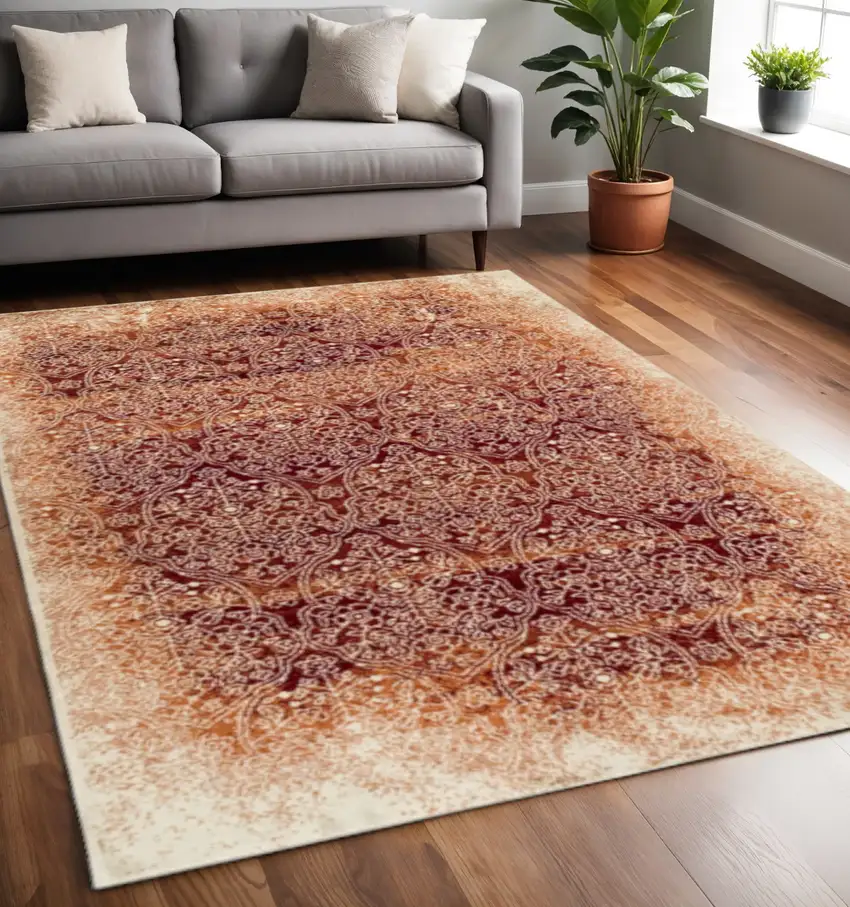Orange Red And Ivory Medallion Area Rug Photo 1