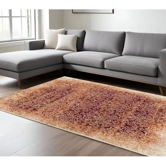 Orange Red And Ivory Medallion Area Rug Photo 1