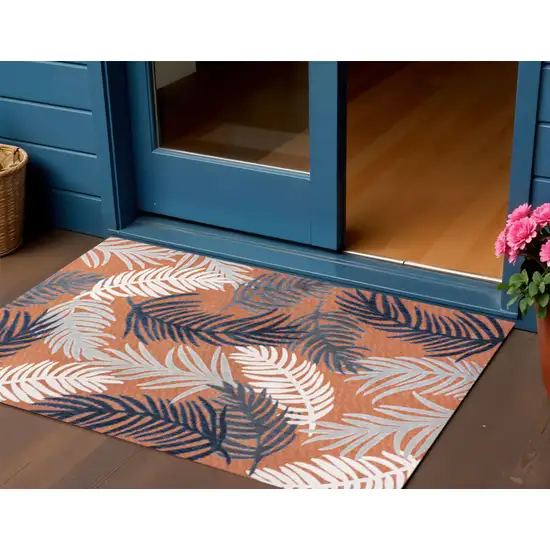 Orange Navy Blue And Ivory Floral Indoor Outdoor Area Rug Photo 1