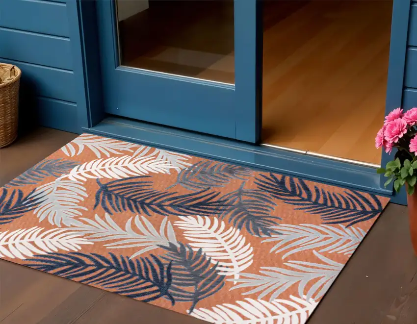 Orange Navy Blue And Ivory Floral Indoor Outdoor Area Rug Photo 1