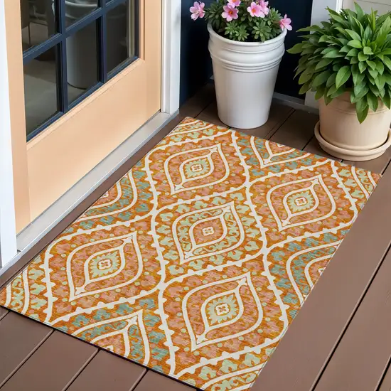 Orange Peach And Ivory Floral Washable Indoor Outdoor Area Rug Photo 1