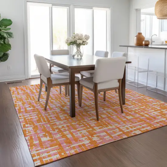Orange Pink And Beige Abstract Washable Indoor Outdoor Area Rug Photo 9