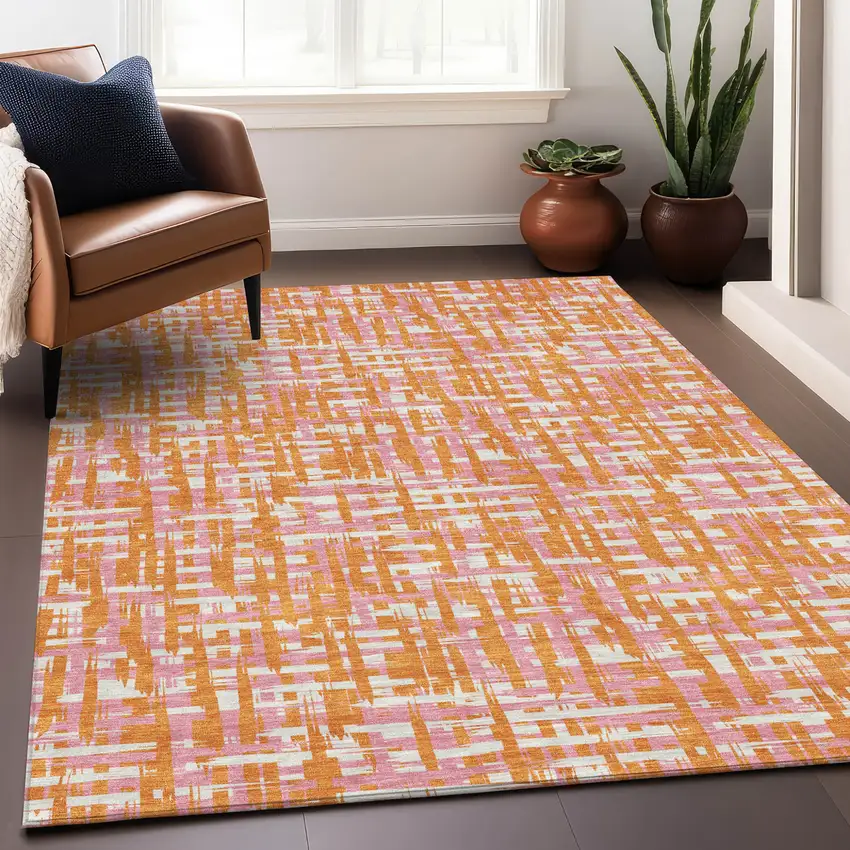 Orange Pink And Beige Abstract Washable Indoor Outdoor Area Rug Photo 9