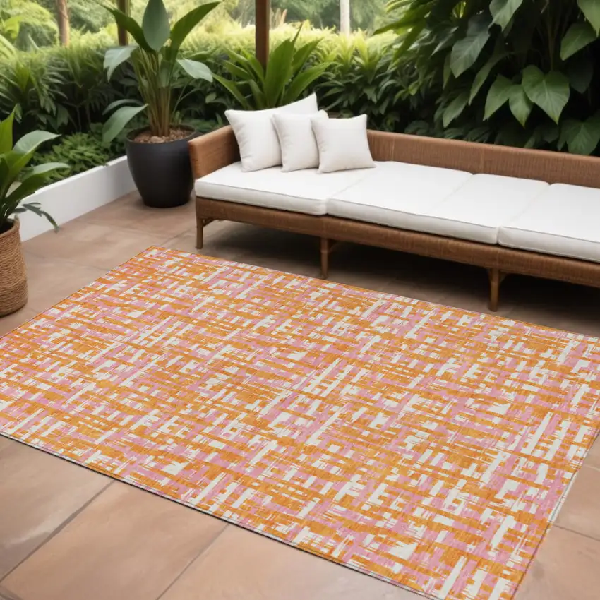 Orange Pink And Beige Abstract Washable Indoor Outdoor Area Rug Photo 1