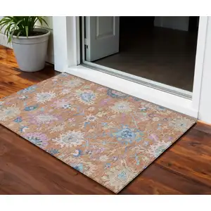 Photo of Orange Pink And Denim Blue Floral Washable Indoor Outdoor Area Rug