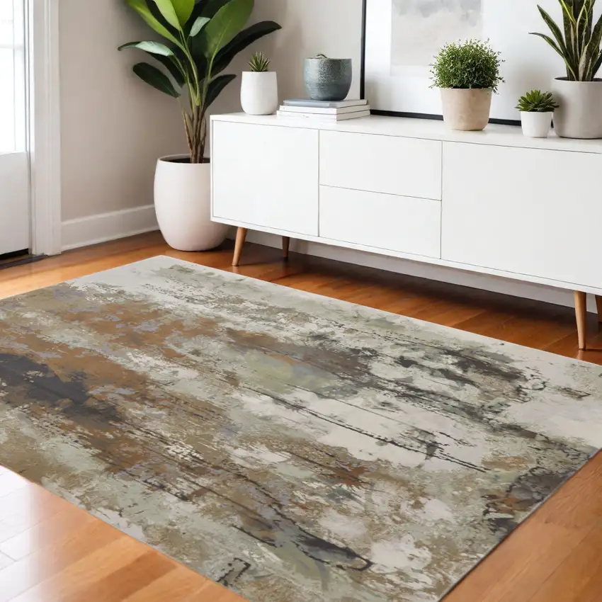 Beige Bronze And Black Abstract Area Rug Photo 1