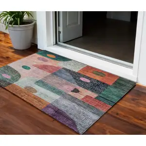 Photo of Orange Purple And Green Geometric Washable Indoor Outdoor Area Rug