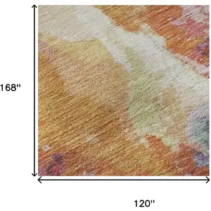 Photo of Orange Red And Teal Abstract Washable Area Rug With UV Protection