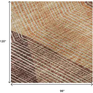 Photo of Orange Salmon And Ivory Geometric Washable Area Rug With UV Protection