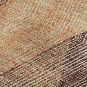 Photo of Orange Salmon And Ivory Geometric Washable Area Rug With UV Protection