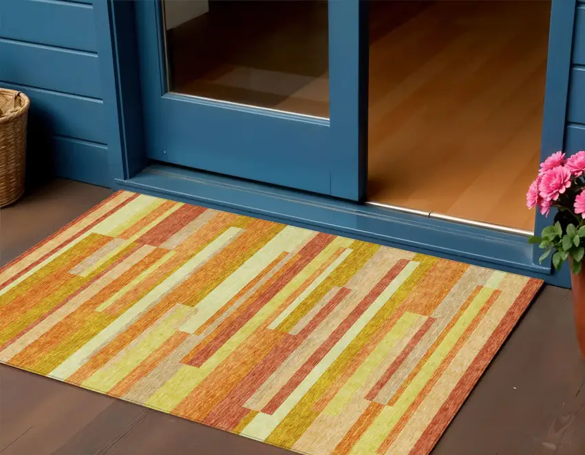 Orange Salmon And Lime Green Striped Washable Indoor Outdoor Area Rug Photo 1