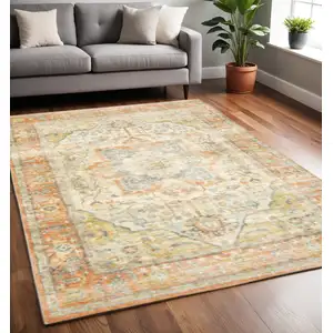 Photo of Orange Silver Gold And Grey Abstract Power Loom Stain Resistant Area Rug