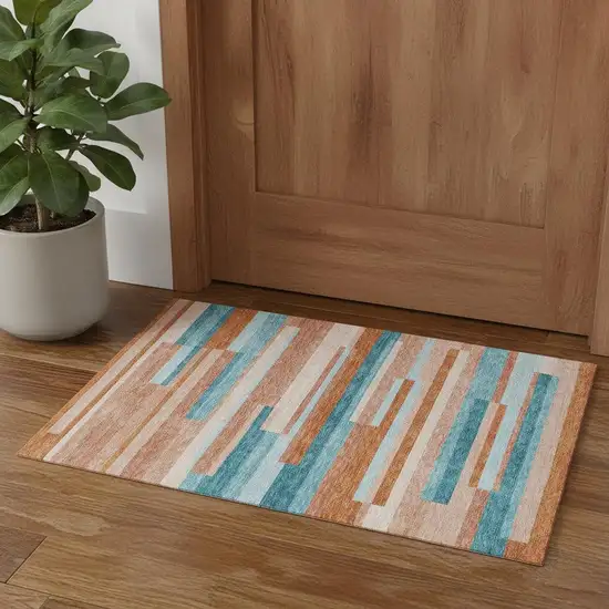 Orange Teal And Peach Striped Washable Area Rug With UV Protection Photo 1