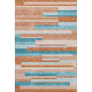 Photo of Orange Teal And Peach Striped Washable Area Rug With UV Protection
