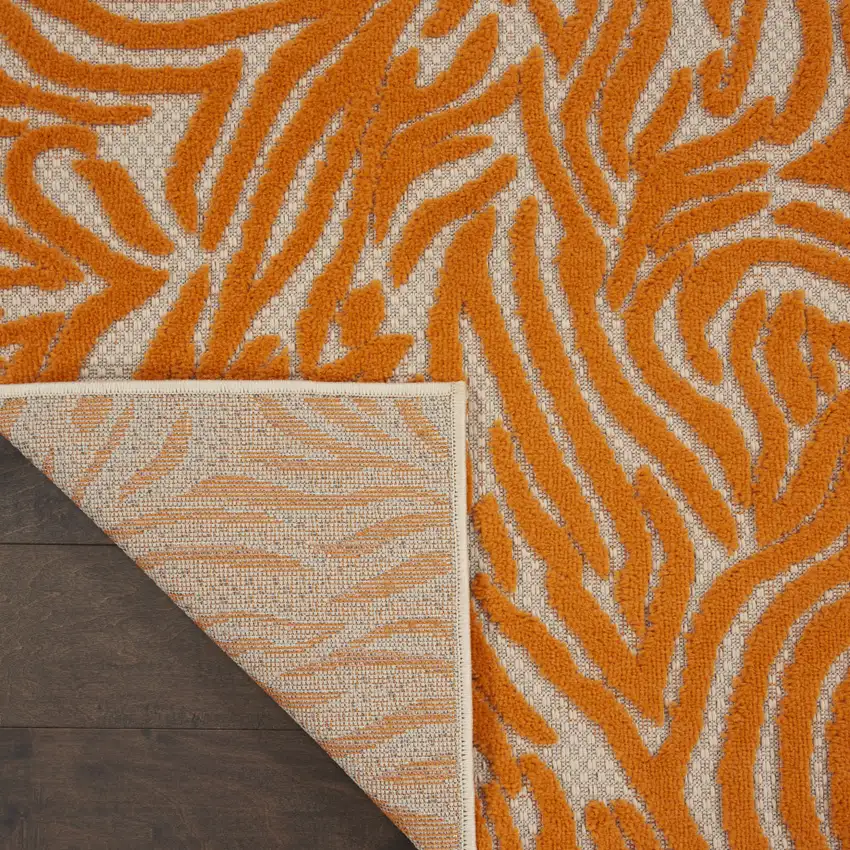 Orange And Ivory Abstract Stain Resistant Indoor Outdoor Area Rug Photo 4