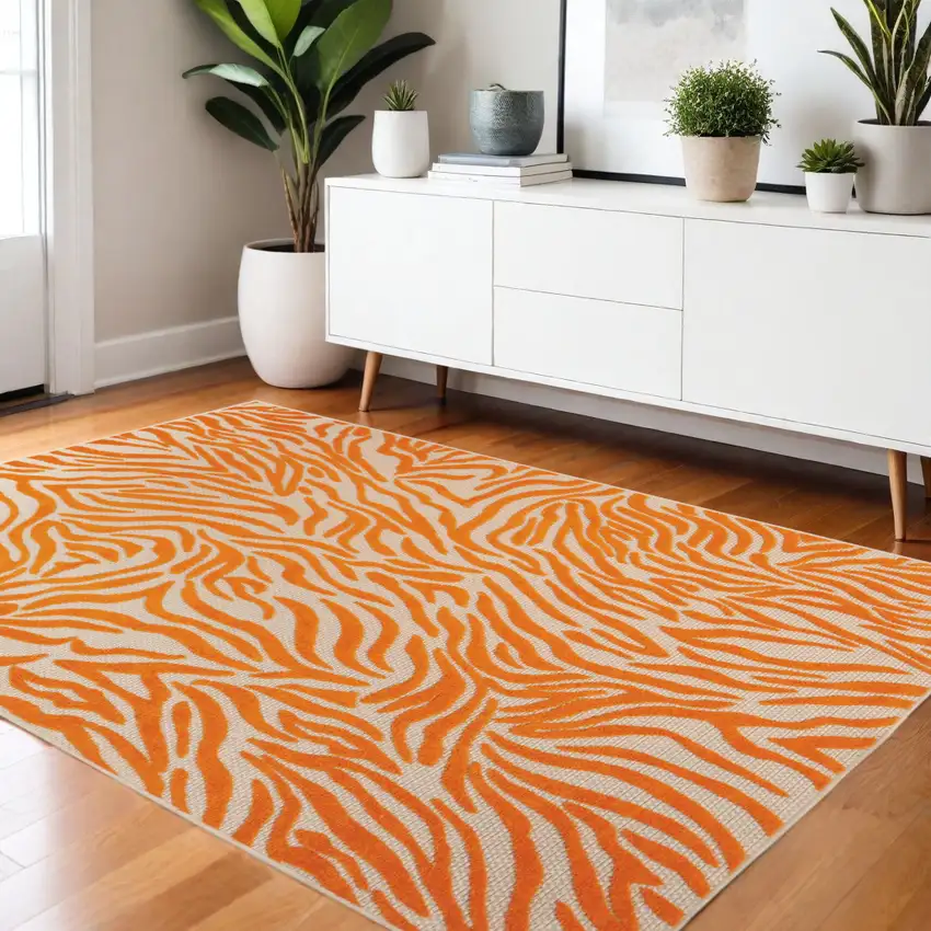 Orange And Ivory Abstract Stain Resistant Indoor Outdoor Area Rug Photo 2
