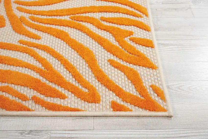 Orange And Ivory Abstract Stain Resistant Indoor Outdoor Area Rug Photo 6