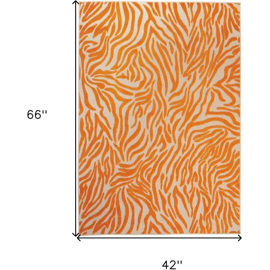 Orange And Ivory Abstract Stain Resistant Indoor Outdoor Area Rug Photo 7